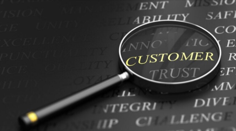 A magnifying glass focus on the word 'CUSTOMER'